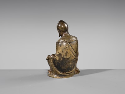 Lot 55 - A RARE BRONZE FIGURE OF A LUOHAN, YUAN-MING DYNASTY