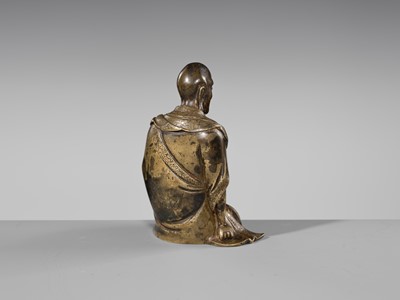 Lot 55 - A RARE BRONZE FIGURE OF A LUOHAN, YUAN-MING DYNASTY