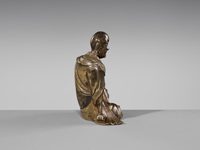 Lot 55 - A RARE BRONZE FIGURE OF A LUOHAN, YUAN-MING DYNASTY