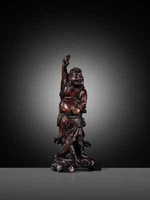 A CARVED WOOD FIGURE OF LIU HAI AND HIS THREE-LEGGED TOAD, LATE QING DYNASTY TO REPUBLIC PERIOD