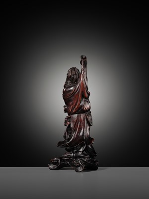 A CARVED WOOD FIGURE OF LIU HAI AND HIS THREE-LEGGED TOAD, LATE QING DYNASTY TO REPUBLIC PERIOD