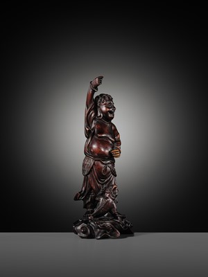 A CARVED WOOD FIGURE OF LIU HAI AND HIS THREE-LEGGED TOAD, LATE QING DYNASTY TO REPUBLIC PERIOD