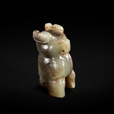 A SUPERB ‘FU HAO TYPE’ CELADON JADE CARVING OF AN OWL, LATE SHANG DYNASTY, ANYANG PHASE
