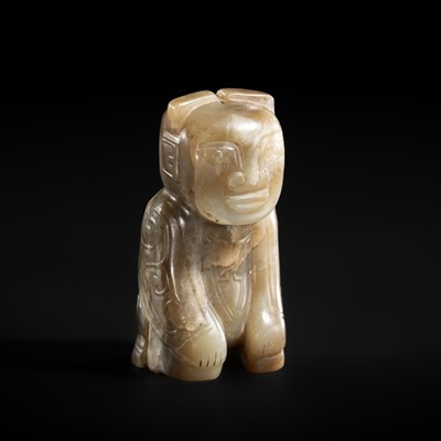 A VERY RARE PALE CELADON JADE ‘KNEELING MAN’ PENDANT, SHANG DYNASTY