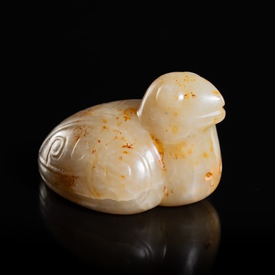 Lot 433 - A CELADON AND RUSSET JADE CARVING OF BIRD, LATE SHANG DYNASTY
