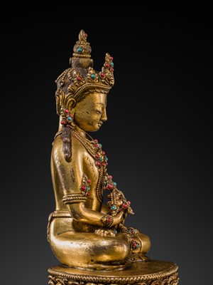 Lot 26 - AN INLAID GILT-BRONZE FIGURE OF AMITAYUS, TIBET, 19TH TO EARLY 20TH CENTURY