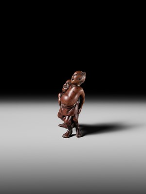 Lot 194 - ITTAN: A WOOD NETSUKE OF TWO SUMO WRESTLERS