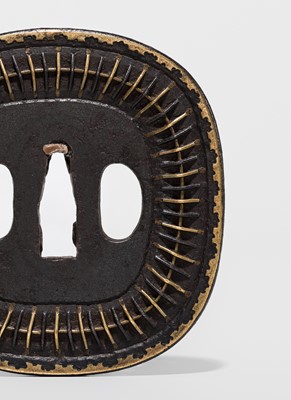 Lot 550 - A FINE IRON AND BRASS SHINGEN MUKADE TSUBA, WITH NBTHK HOZON TOSOGU CERTIFICATE