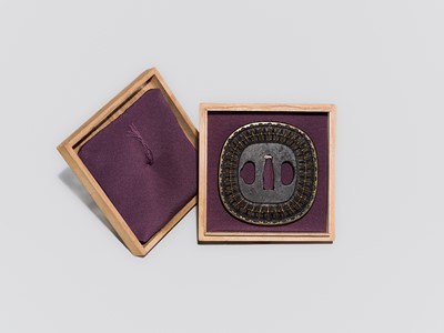 Lot 550 - A FINE IRON AND BRASS SHINGEN MUKADE TSUBA, WITH NBTHK HOZON TOSOGU CERTIFICATE