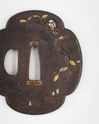 Lot 554 - A FINE IRON MITO SCHOOL TSUBA DEPICTING AN OWL, WITH NBTHK KICHO KODOGU CERTIFICATE