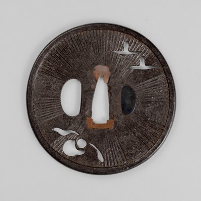 Lot 1839 - AN IRON SUKASHI TSUBA WITH CRANES AND FLOWERHEADS