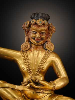 A GILT BRONZE FIGURE OF THE MAHASIDDHA VIRUPA, 18TH – 19TH CENTURY