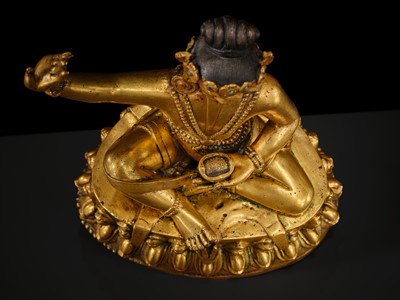A GILT BRONZE FIGURE OF THE MAHASIDDHA VIRUPA, 18TH – 19TH CENTURY