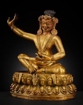 A GILT BRONZE FIGURE OF THE MAHASIDDHA VIRUPA, 18TH – 19TH CENTURY