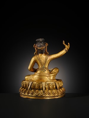 A GILT BRONZE FIGURE OF THE MAHASIDDHA VIRUPA, 18TH – 19TH CENTURY