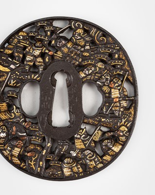Lot 555 - SOHEISHI SOTEN: A FINE IRON SUKASHI SOTEN TSUBA WITH WARRIORS