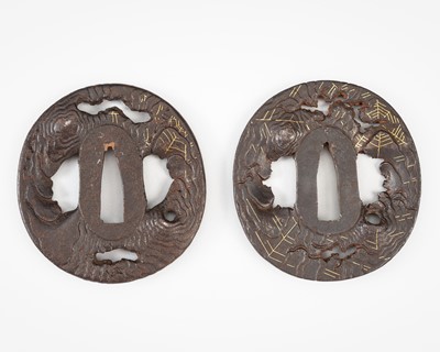 Lot 557 - A DAISHO PAIR OF SHOAMI SCHOOL IRON TSUBA WITH GILT SPIDERWEBS