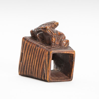 Lot 1648 - MASANAO: A FINE NETSUKE OF TWO FROGS ON A BUCKET