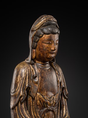 Lot 63 - A GILT-LACQUERED WOOD FIGURE OF GUANYIN, MING DYNASTY