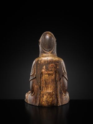 Lot 63 - A GILT-LACQUERED WOOD FIGURE OF GUANYIN, MING DYNASTY