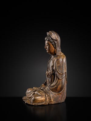 Lot 63 - A GILT-LACQUERED WOOD FIGURE OF GUANYIN, MING DYNASTY