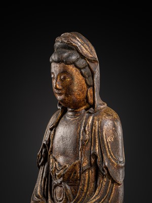 Lot 63 - A GILT-LACQUERED WOOD FIGURE OF GUANYIN, MING DYNASTY