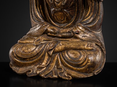 Lot 63 - A GILT-LACQUERED WOOD FIGURE OF GUANYIN, MING DYNASTY