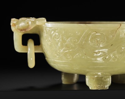 Lot 128 - A YELLOW AND RUSSET JADE ‘CHILONG’ TRIPOD CENSER, 18TH-19TH CENTURY