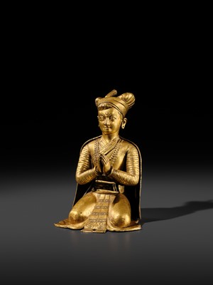 Lot 27 - AN IMPORTANT GILT COPPER ALLOY FIGURE OF A ROYAL DONOR, NEPAL, 17TH-18TH CENTURY