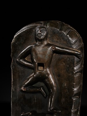 Lot 21 - A GILT-BRONZE FIGURE OF NILAMBARA VAJRAPANI, TIBET, 16TH-17TH CENTURY