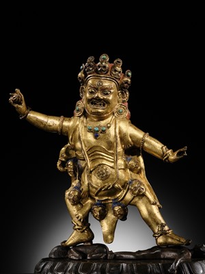 Lot 21 - A GILT-BRONZE FIGURE OF NILAMBARA VAJRAPANI, TIBET, 16TH-17TH CENTURY