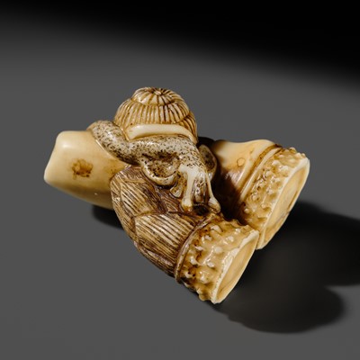 RAISEN: A FINE IVORY NETSUKE OF A SNAIL ON BAMBOO