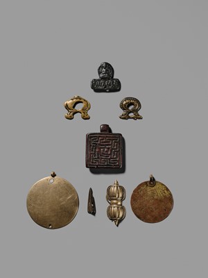 Lot 1 - A GROUP OF THOGCHAGS, MELONG, AND PENDANTS, 12TH-15TH CENTURY