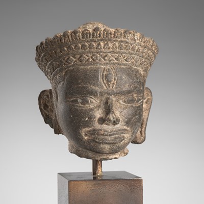 Lot 1309 - A SMALL SANDSTONE HEAD OF A MALE DEITY, ANGKOR PERIOD