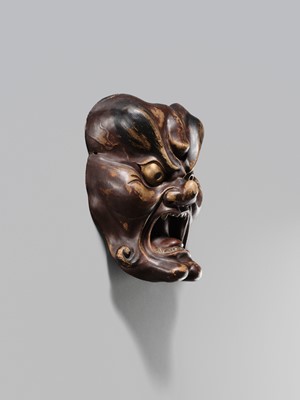 Lot 93 - A LACQUERED WOOD BUGAKU MASK OF A DEMON