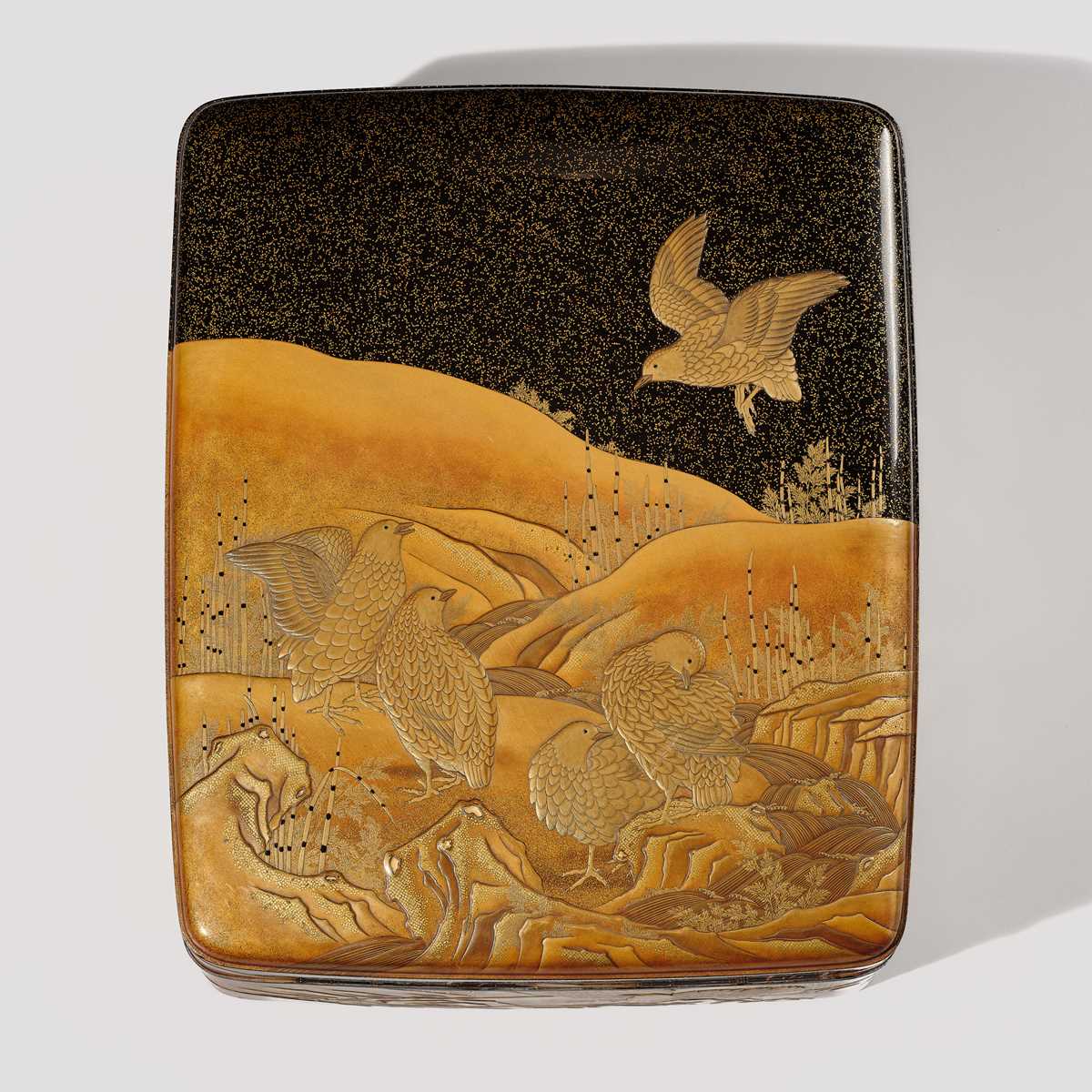A SUPERB LACQUER BUNKO (DOCUMENT BOX) DEPICITING QUAILS AND AUTUMN GRASSES