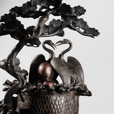 Lot 5 - A MASSIVE BRONZE OKIMONO OF A MINOGAME AND NESTING CRANES ON MOUNT HORAI