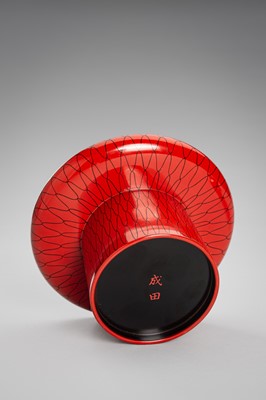 Lot 139 - SEIHO: A SMALL LACQUER SAKE CUP (SAKAZUKI), STAND WITH A KOI AND A TOMOBAKO (STORAGE BOX)