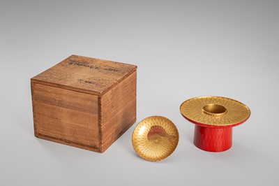 Lot 139 - SEIHO: A SMALL LACQUER SAKE CUP (SAKAZUKI), STAND WITH A KOI AND A TOMOBAKO (STORAGE BOX)