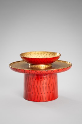 Lot 139 - SEIHO: A SMALL LACQUER SAKE CUP (SAKAZUKI), STAND WITH A KOI AND A TOMOBAKO (STORAGE BOX)