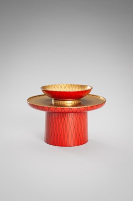 Lot 139 - SEIHO: A SMALL LACQUER SAKE CUP (SAKAZUKI), STAND WITH A KOI AND A TOMOBAKO (STORAGE BOX)