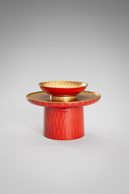 Lot 139 - SEIHO: A SMALL LACQUER SAKE CUP (SAKAZUKI), STAND WITH A KOI AND A TOMOBAKO (STORAGE BOX)