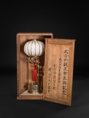 Lot 2 - A RARE IMPERIAL LAMP WITH KIKUMON, GIFTED TO COUNT MATSUDAIRA TO CELEBRATE THE BIRTH OF PRINCESS SHIGEKO, DATED 1926