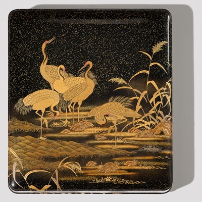 AN IMPRESSIVE MATCHING SET OF A RYOSHIBAKO (DOCUMENT BOX) AND SUZURIBAKO (WRITING BOX) WITH CRANES, YOUNG PINES AND THE RISING SUN AND MOON
