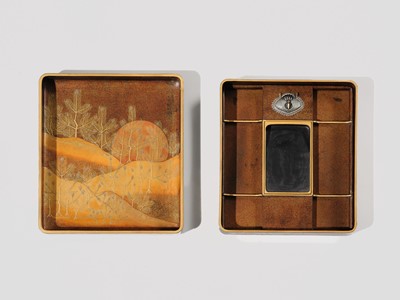 AN IMPRESSIVE MATCHING SET OF A RYOSHIBAKO (DOCUMENT BOX) AND SUZURIBAKO (WRITING BOX) WITH CRANES, YOUNG PINES AND THE RISING SUN AND MOON