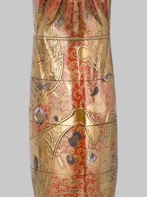 Lot 36 - AN IMPRESSIVE AND LARGE FOUR-CASE LACQUER INRO IN THE FORM OF A KINCHAKU DEPICTING THE SEVEN LUCKY GODS (SHICHIFUKUJIN)