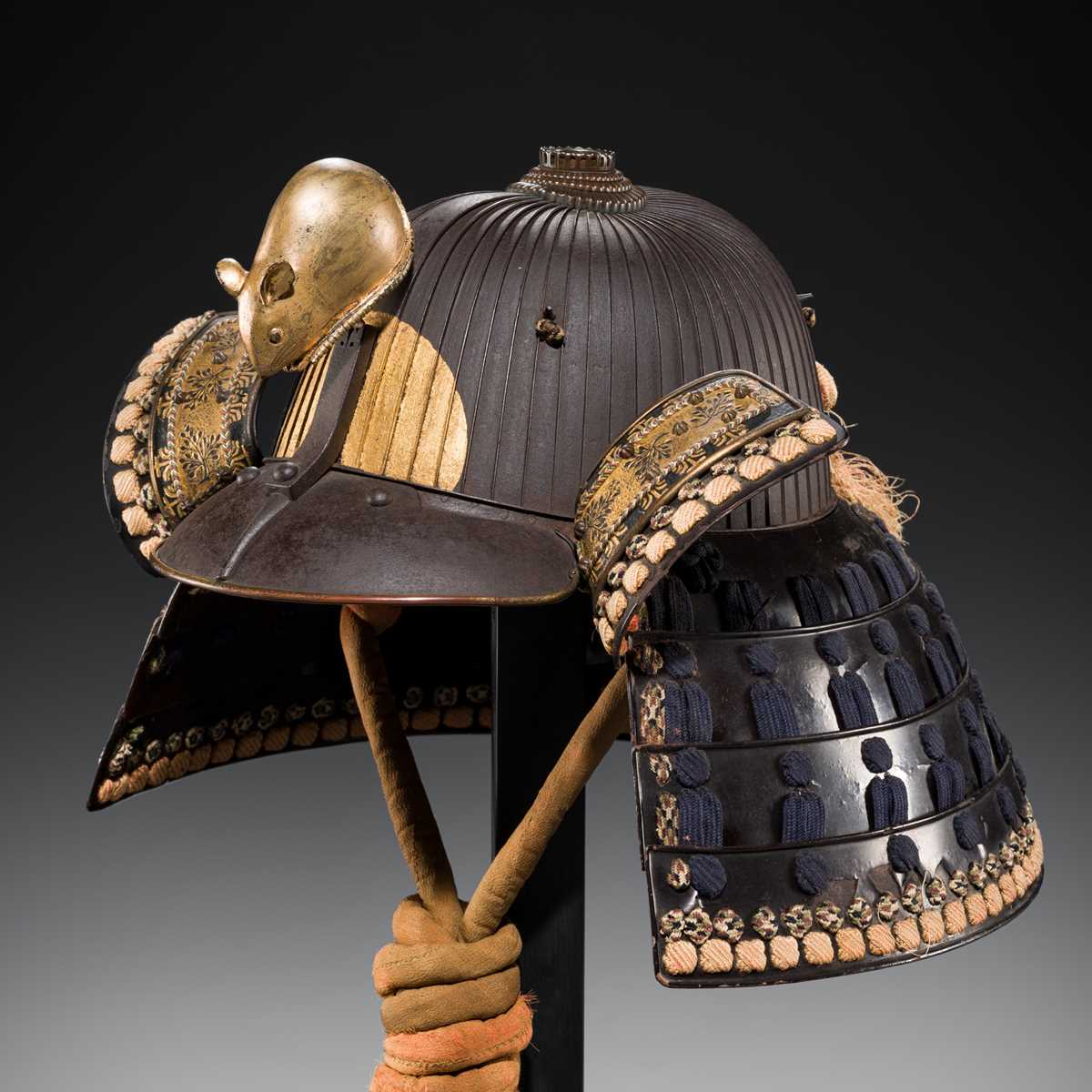 A LACQUERED RUSSET-IRON SUJIBACHI KABUTO WITH ‘DAIKOKU’S RAT’ MAEDATE