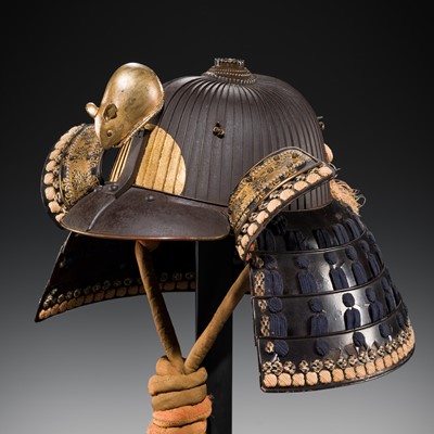 A LACQUERED RUSSET-IRON SUJIBACHI KABUTO WITH ‘DAIKOKU’S RAT’ MAEDATE