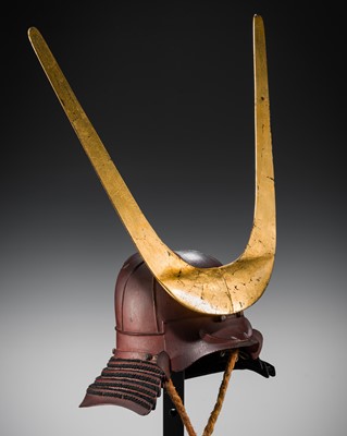Lot 514 - A RED-LACQUERED IRON SUJIBACHI KABUTO WITH TENTSUKU MAEDATE