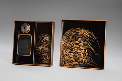 Lot 152 - OGATA KORIN: A RINPA-STYLE INLAID LACQUER SUZURIBAKO WITH FANS AND REEDS